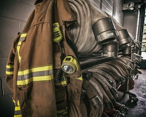 Firefighter gear helmet on a truck