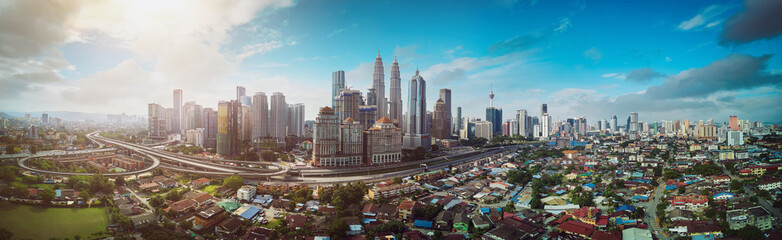 Poster - Panorama cityscape view in the middle of Kuala Lumpur city center , early morning with little mist , Malaysia .