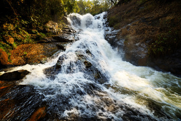 Sticker - The Datanla waterfall with crystal clear water among green woods