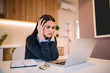© Nebojsa - Frustrated worried young woman looks at laptop upset by bad news, teenager feels shocked afraid reading negative bullying message, stressed girl troubled with problem online or email notification.