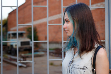 Wall Mural - blue haired goth girl walk on abandoned factory