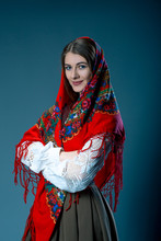 Russian Beauty Woman In The National Patterned Shawl On Blue Grey Background. Maslenitsa