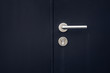 Close up keys lock in black door