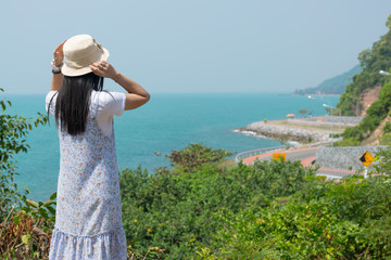 Wall Mural - Women travel on holiday summer the sea of Kung Wiman, Chanthaburi, Thailand