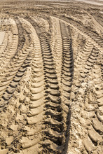 Tractor Tyre Tracks In Beach Sand