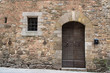 Door and window in ancient brick wall