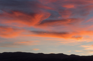 Wall Mural - Red orange cloudscape.