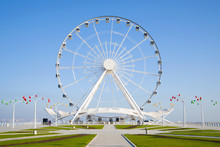 Ferris Wheel Close-up Against The Blue Sky. Baku, Azerbaijan