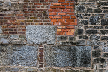 Various types of stone and brick wall Patchwork background texture