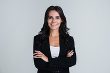 Perfect Business Lady. Beautiful Young Businesswoman Looking At Camera With Smile While Standing Against White Background