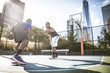 © oneinchpunch - Basketball player playing outdoors