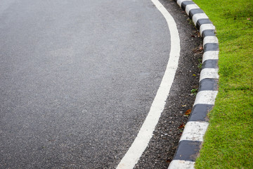 Asphalt road with the white line background.