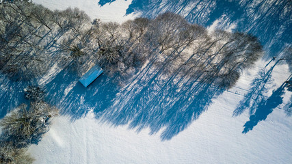 Poster - Drone view of a golf course covered by snow