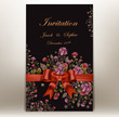 floral wedding invitation with a ribbon and bow