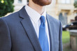 © flil - Stylish young man on the street, business clothes