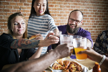 Wall Mural - Friends eating pizza together at home