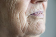 Side portrait close up of elderly woman's mouth