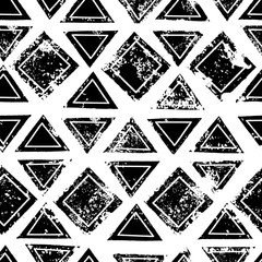 Wall Mural - Black and white triangles and squares aged geometric ethnic grunge seamless pattern, vector