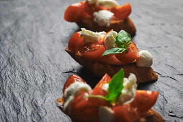 Wall Mural - bruschetta with mozzarella and tomatoes