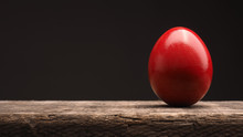Red Colored Easter Egg On Wood