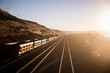 © Mat Rick Photography - Views of train tracks and cars from a train.