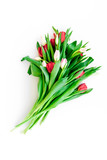 Fototapeta Tulipany - Spring bouquet of tulips on white background top view copy space