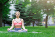 © Prostock-studio - Young woman outdoors, relax meditation pose