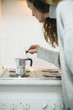 © ADDICTIVE STOCK - Hand opening coffee pot