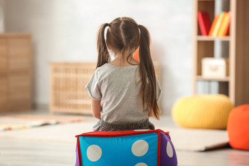 lonely little girl at home. autism concept