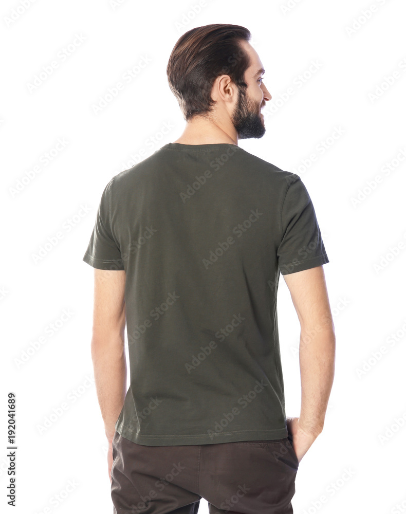 Young man in stylish t-shirt on white background. Mockup for design