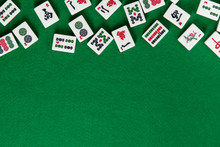 White-green Tiles For Mahjong On On Green Cloth Background. Emty Space From Below