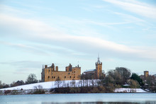 Linlithgow Palace And Loch In Winter With Snow; The Birthplace Of Mary, Queen Of Scots; Situated By Linlithgow Peel, West Lothian, Scotland.