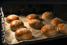 Tasty Buns With Sesame. Freshly Baked Buns. Hot, Fresh From The Oven Hamburger Buns. Homemade Brioche Hamburger Buns