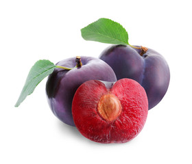 Wall Mural - Ripe sweet plums on white background