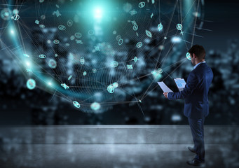 Poster - Businessman watching digital sphere interface on a rooftop 3D rendering