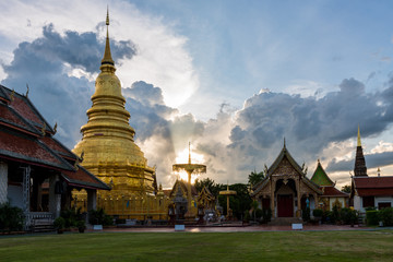 wat phra that hariphunchai at sunset time in lamphun province, thailand. most famous temple in north