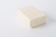 © ddukang - Raw tofu on white background.