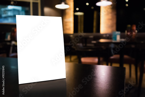 Download Mockup White Label Menu Frame On Table With Cafe Restaurant Interior Background Stock Photo Adobe Stock
