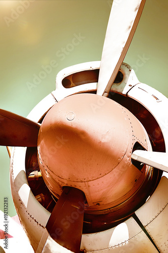 Fotografia, Obraz Closeup of an old airplane turboprop engine with propeller blades and parts of a