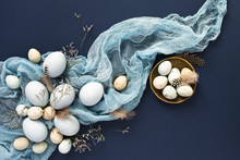Easter Background With Blue Painted Eggs And Napkin On Dark Blue Backround.