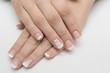 © honcharr - Manicure and white abstract pattern on women's nails