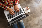Fototapeta  - Top view, Business woman typing on laptop at workplace Woman working in home office hand keyboard, Hands of young people typing on laptop in the office,