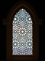 Wall Mural - Islamic interior design of the mosque. Islamic window with traditional pattern. Background greeting cards Ramadan Kareem. 3D rendering.