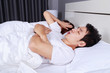 © geargodz - couple have problem with man's snoring on bed