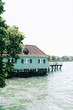 Blue building standing in water in Bodensee, Germany