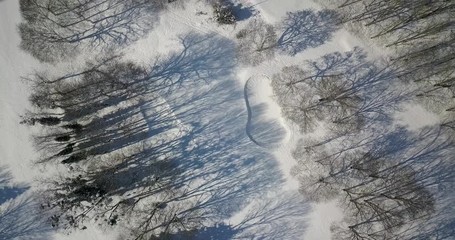 Sticker - Drone video of a golf course covered by snow