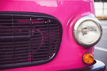 Pink Retro Car With Round Headlights