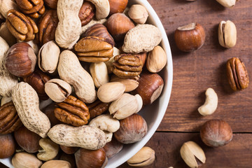 Wall Mural - Mix of nuts in plate