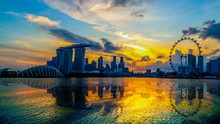 SINGAPORE CITY, SINGAPORE : Feb 12,2018: Singapore Skyline. Singapore`s Business District, Marina Bay Sand And The Garden By The Bay On Sunset Time-lapse