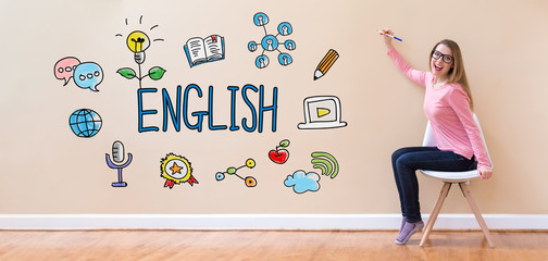 Wall Mural - English with young woman holding a pen in a chair